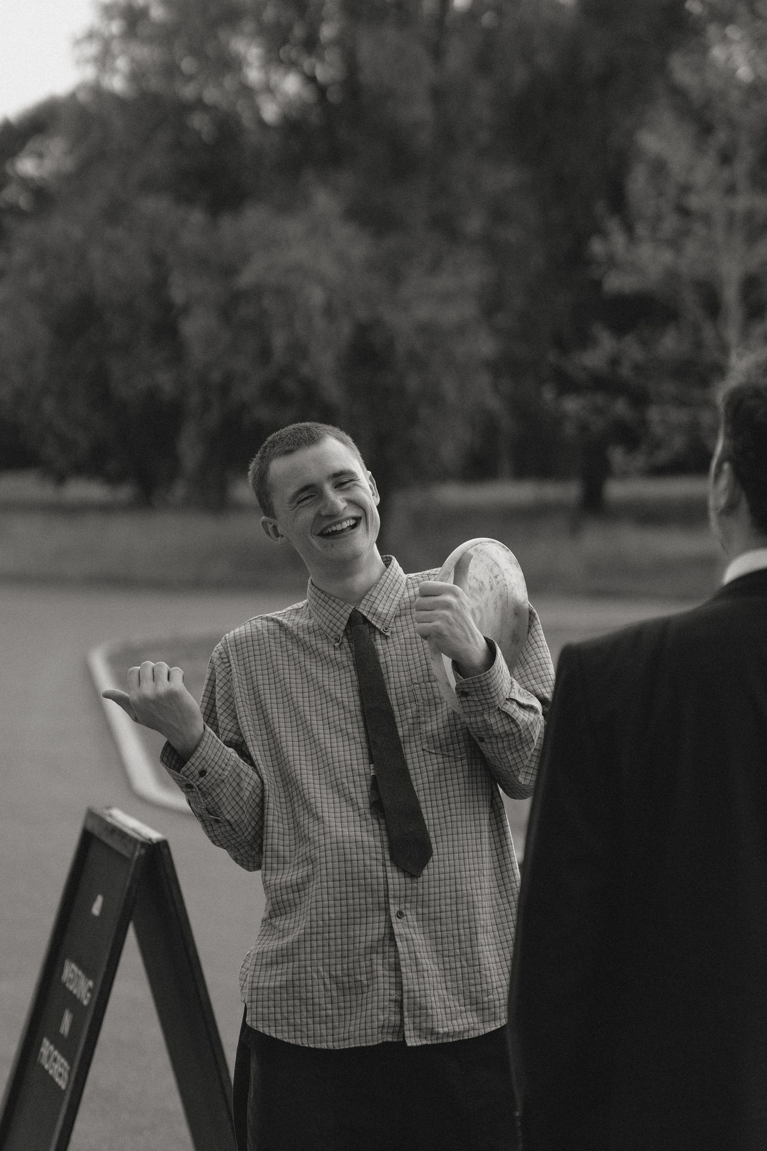 Candid moments of laughter during a wedding celebration.