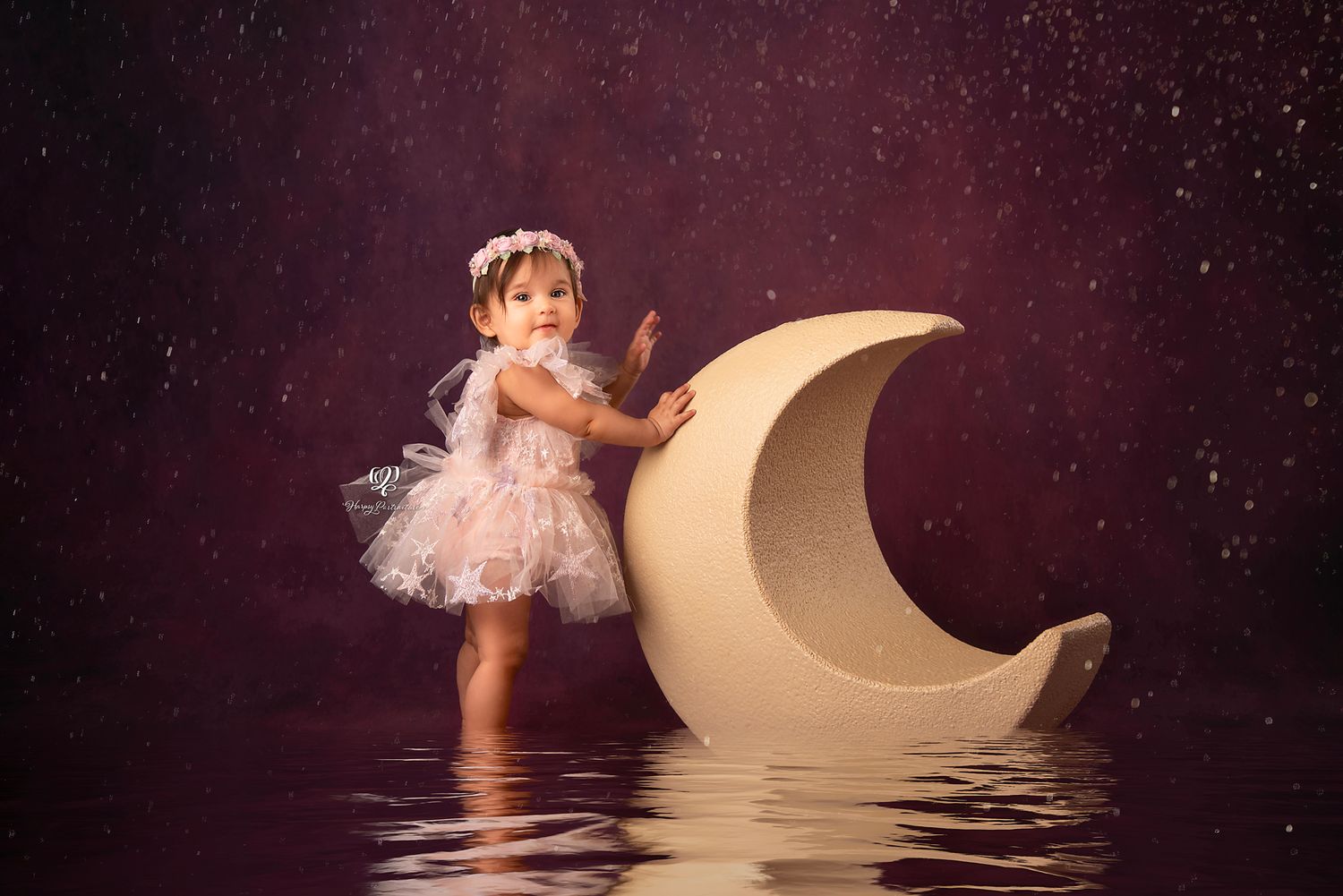 Sitter Baby photoshoot Lexington, SC; baby girl photos with pink tulle dress indoor studio; baby girl standing near moon