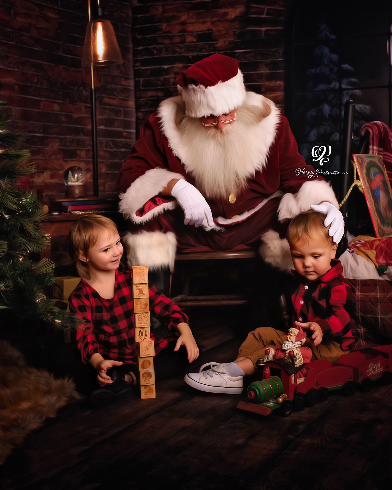 Santa playing blocks and Santa train with children during Santa mini session Lexington, SC; not mall Santa photos; pictu