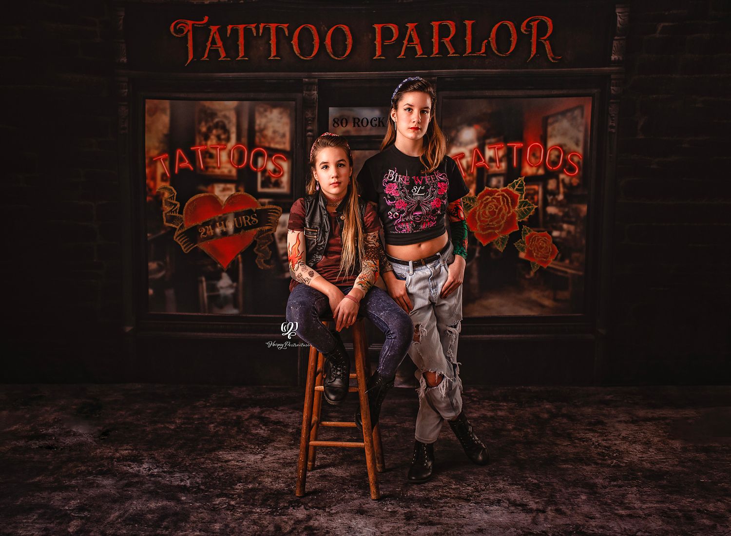 Fun tattoo-themed photoshoot; girls posing in themed photography session for Tattoo Parlor in professional portrait studio in Lexington, SC