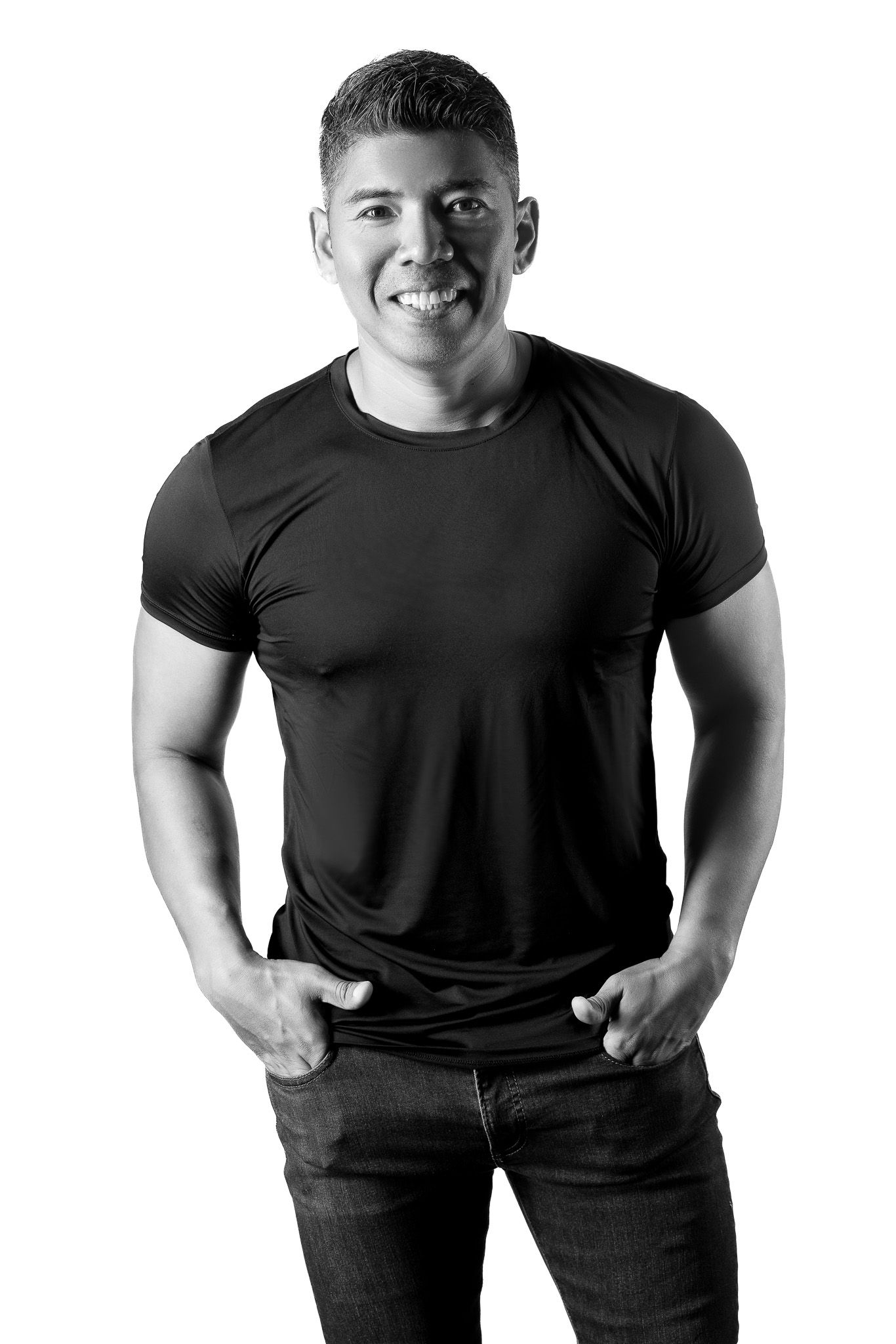 A sequence of four black and white photos showing someone in a black shirt making playful poses and expressions.