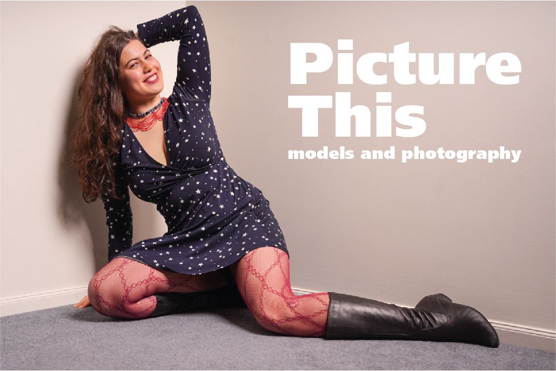Woman in polka dot dress and red fishnet tights posing for Picture This models photography. portrait photography Christchurch