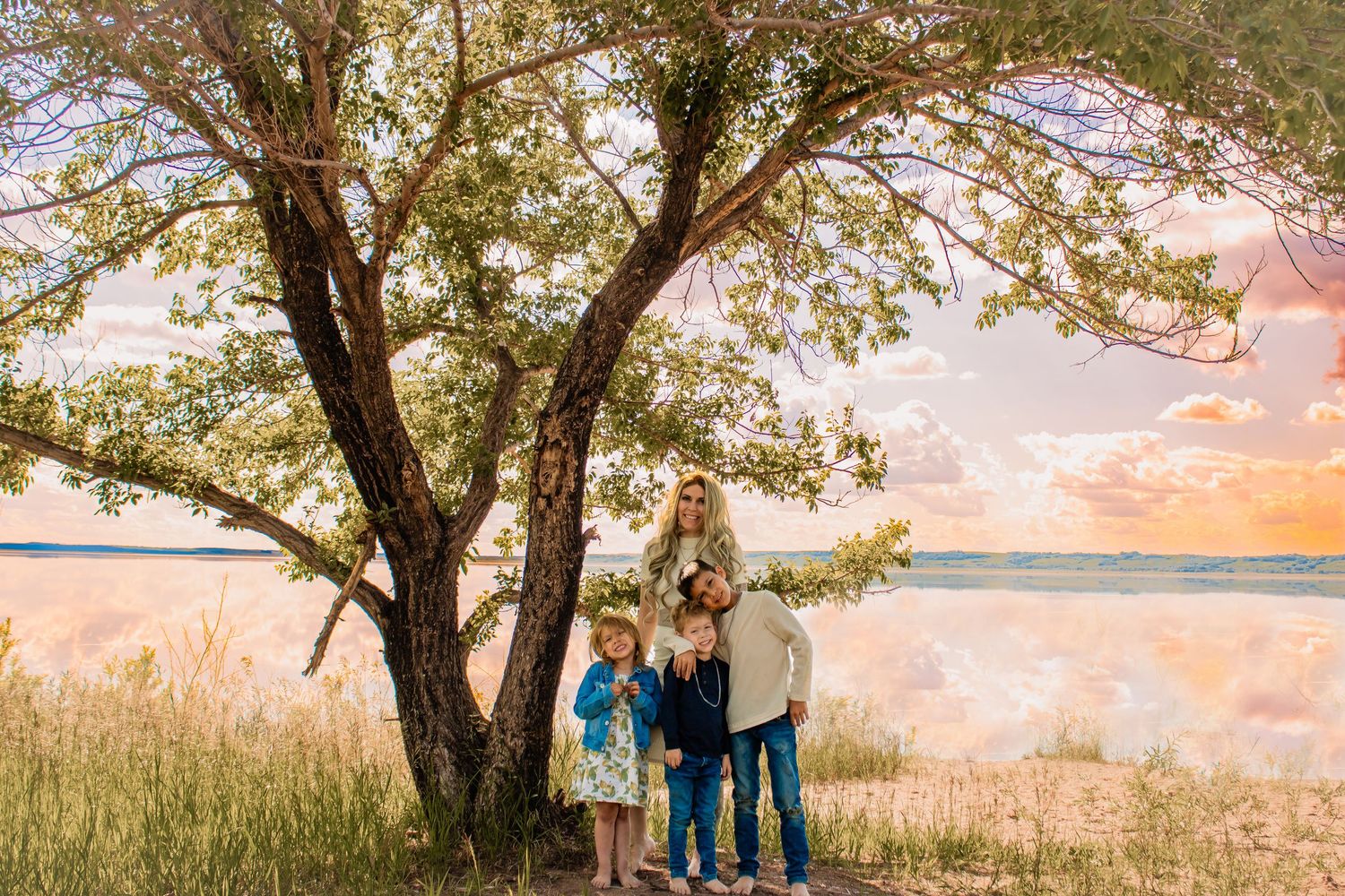 Lloydminster photographer specializing in weddings, portraits, maternity & sports. Known for golden hour magic and honest, beautiful images.
