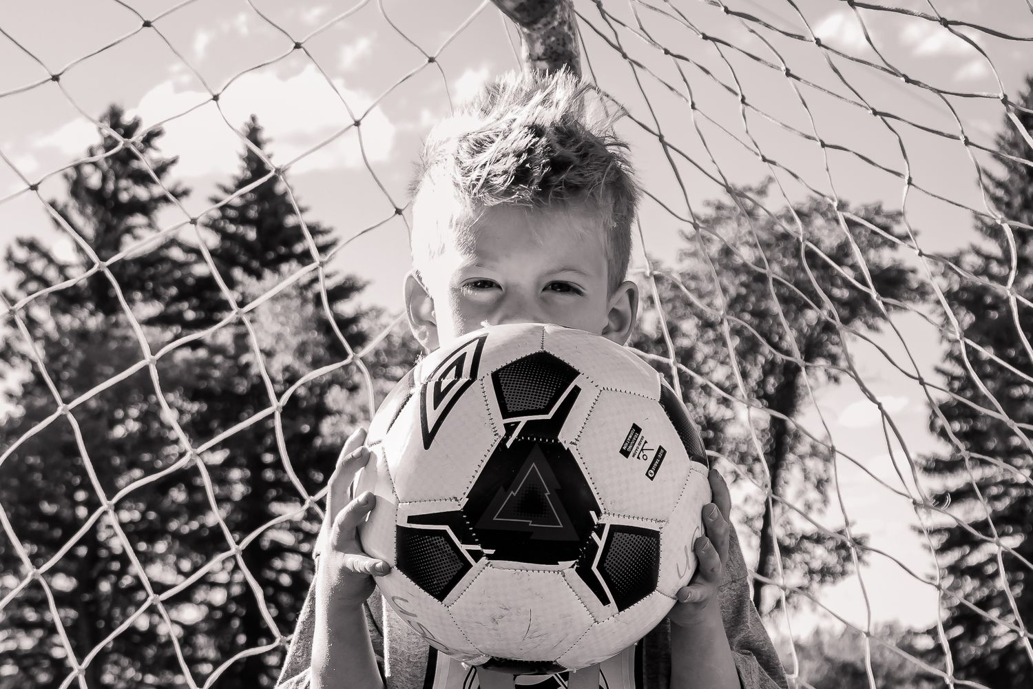 Lloydminster photographer specializing in weddings, portraits, maternity & sports. Known for golden hour magic and honest, beautiful images.