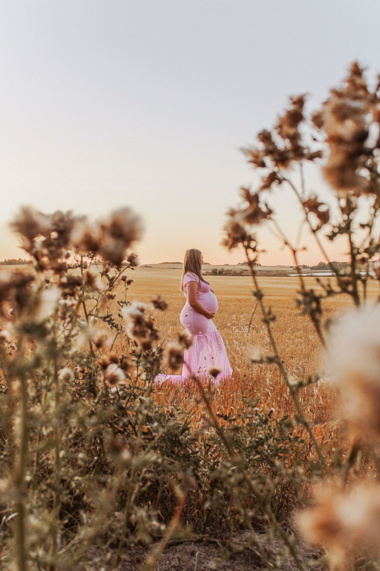 Lloydminster photographer specializing in weddings, portraits, maternity & sports. Known for golden hour magic and honest, beautiful images.