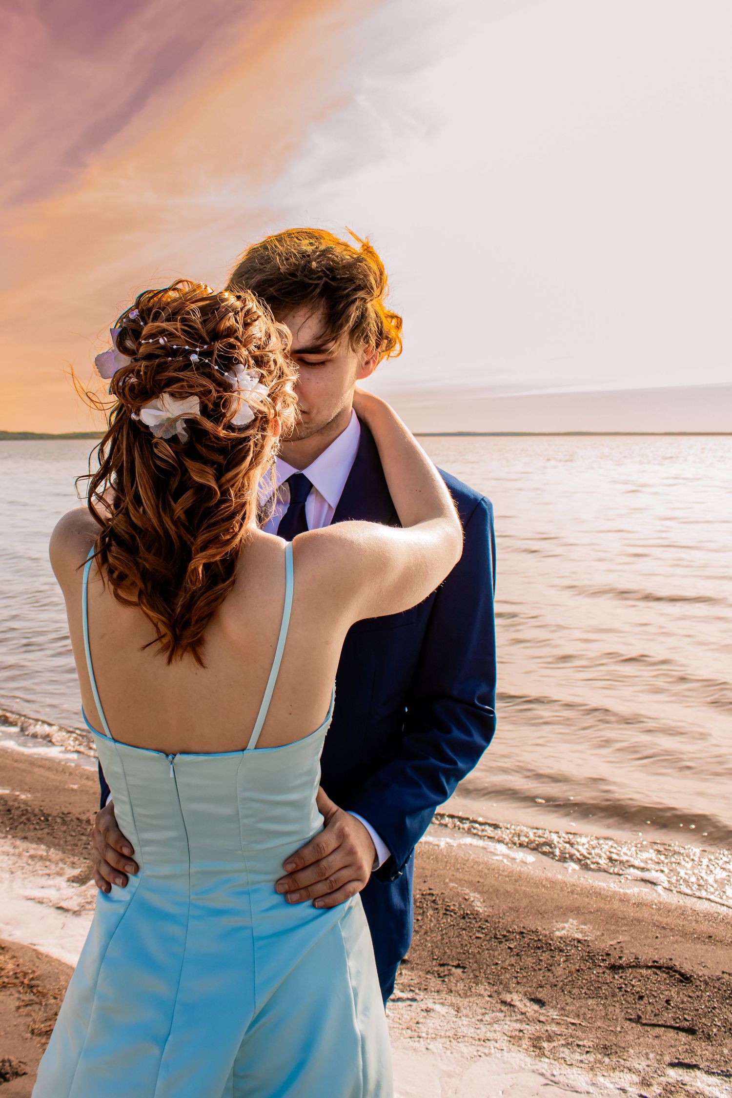 Lloydminster photographer specializing in weddings, portraits, maternity & sports. Known for golden hour magic and honest, beautiful images.