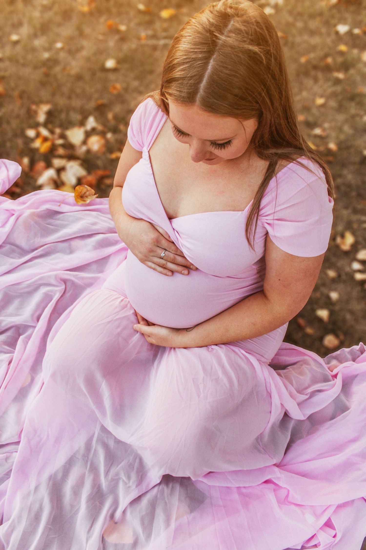 Lloydminster photographer specializing in weddings, portraits, maternity & sports. Known for golden hour magic and honest, beautiful images.
