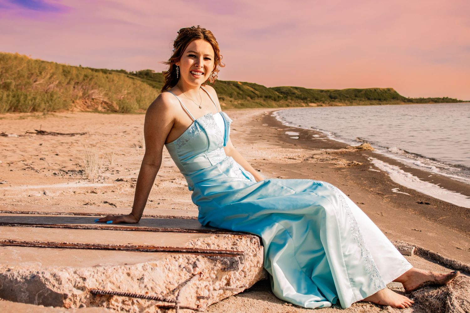 Lloydminster photographer specializing in weddings, portraits, maternity & sports. Known for golden hour magic and honest, beautiful images.