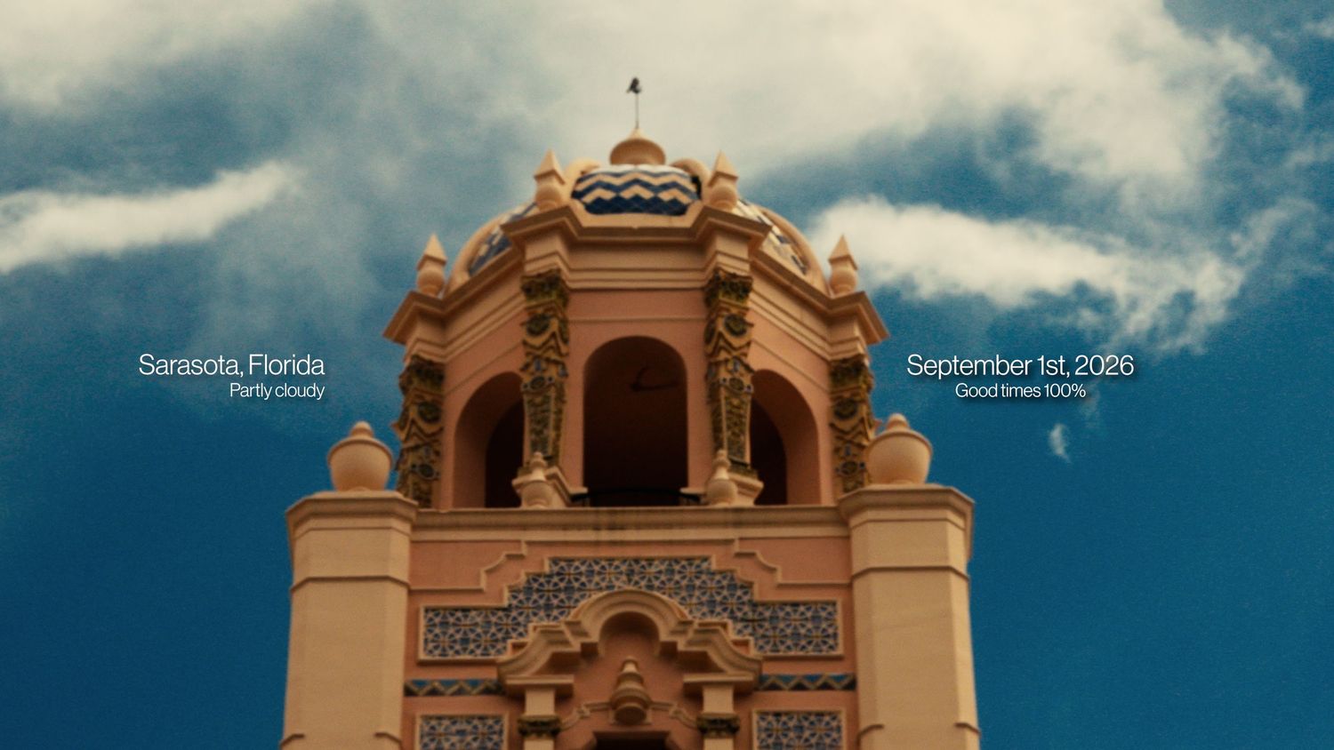 Sarasota Florida ornate mission-style bell tower under blue sky September 2029.