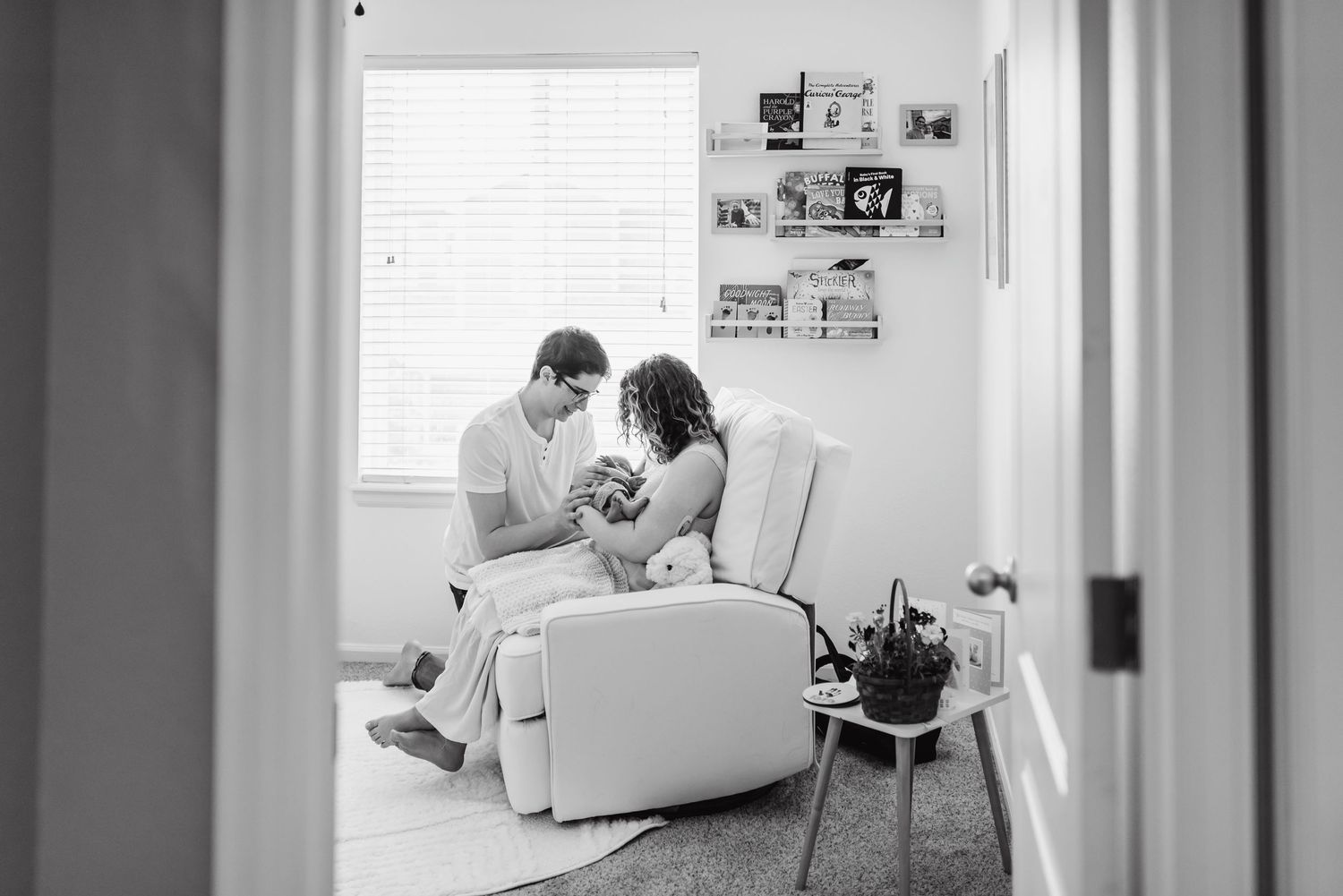 cozy in home newborn session of parents and baby at their home in Aurora Colorado. Aurora Colorado Newborn Photographer
