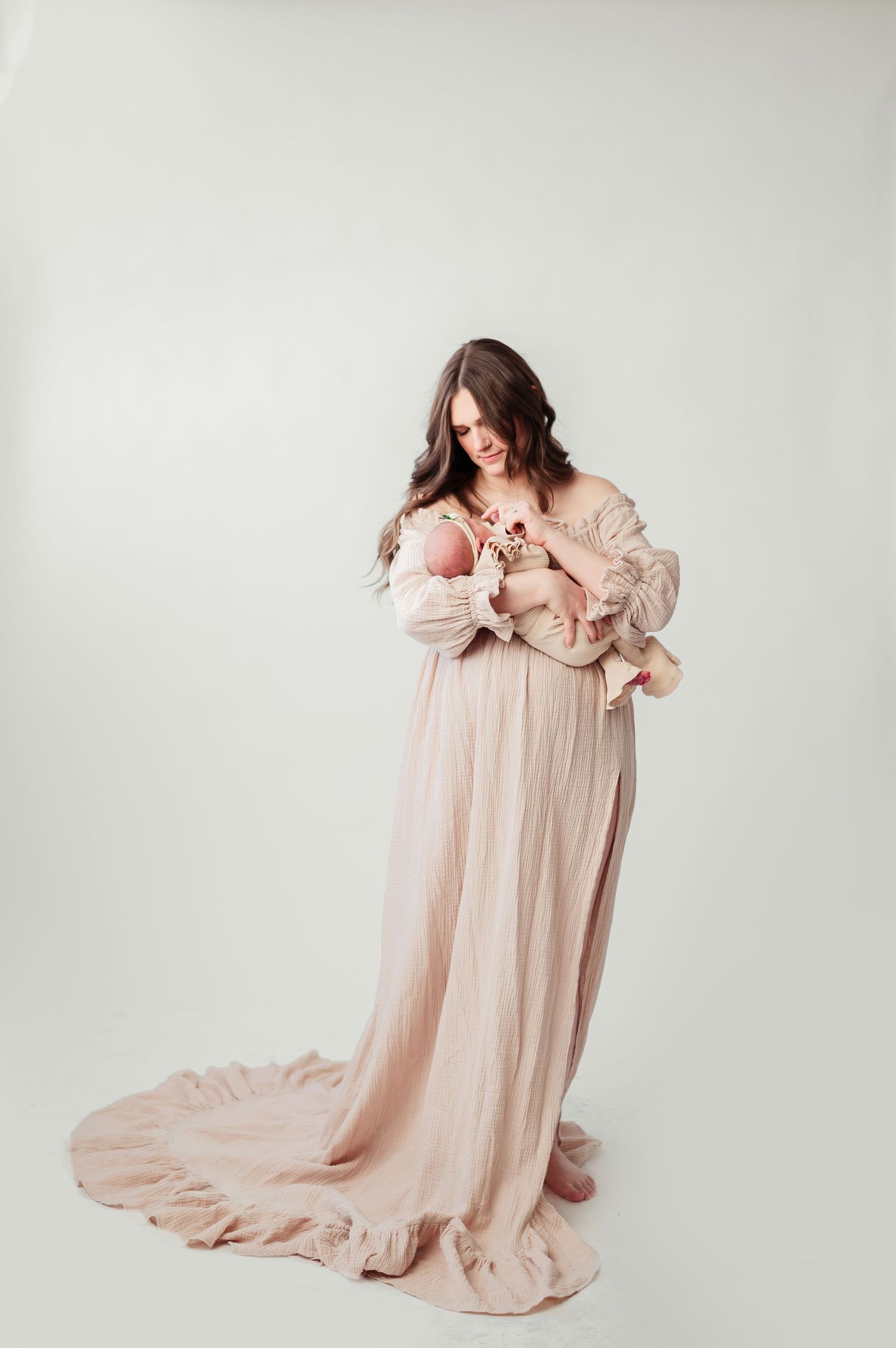 Posed Newborn Photographer based in Denver Colorado offering in Studio Newborn Photo sessions. Centennial Colorado photography studio
