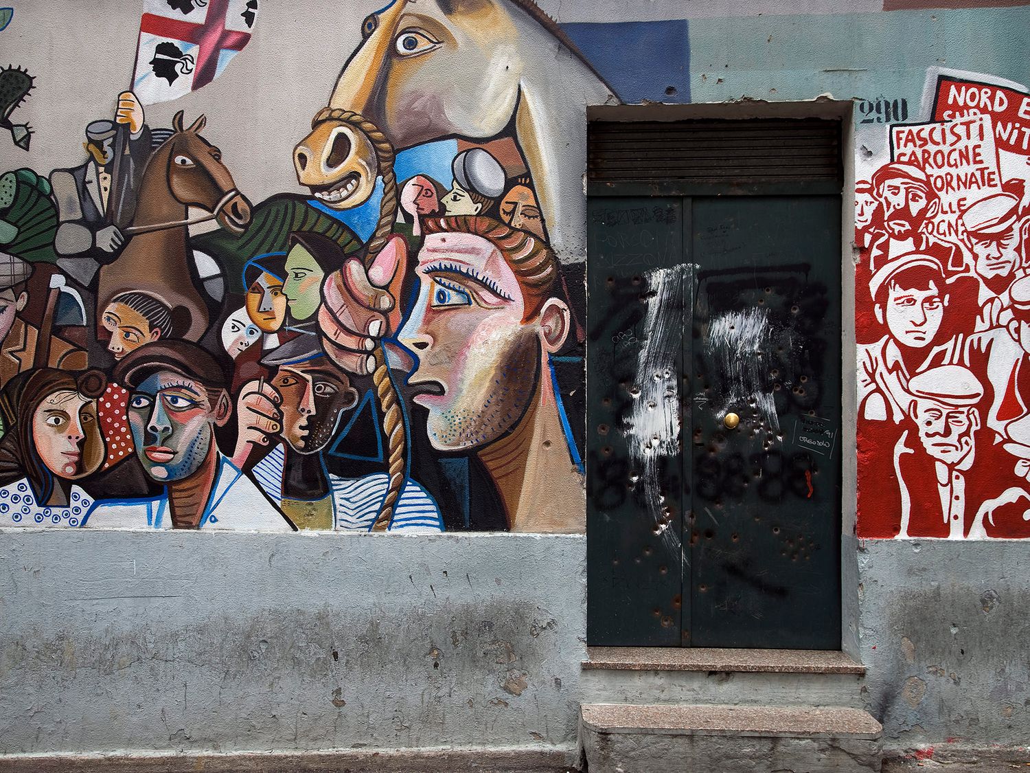 Colorful street art mural featuring figures, horses, and bold graphic illustrations on an urban building wall.