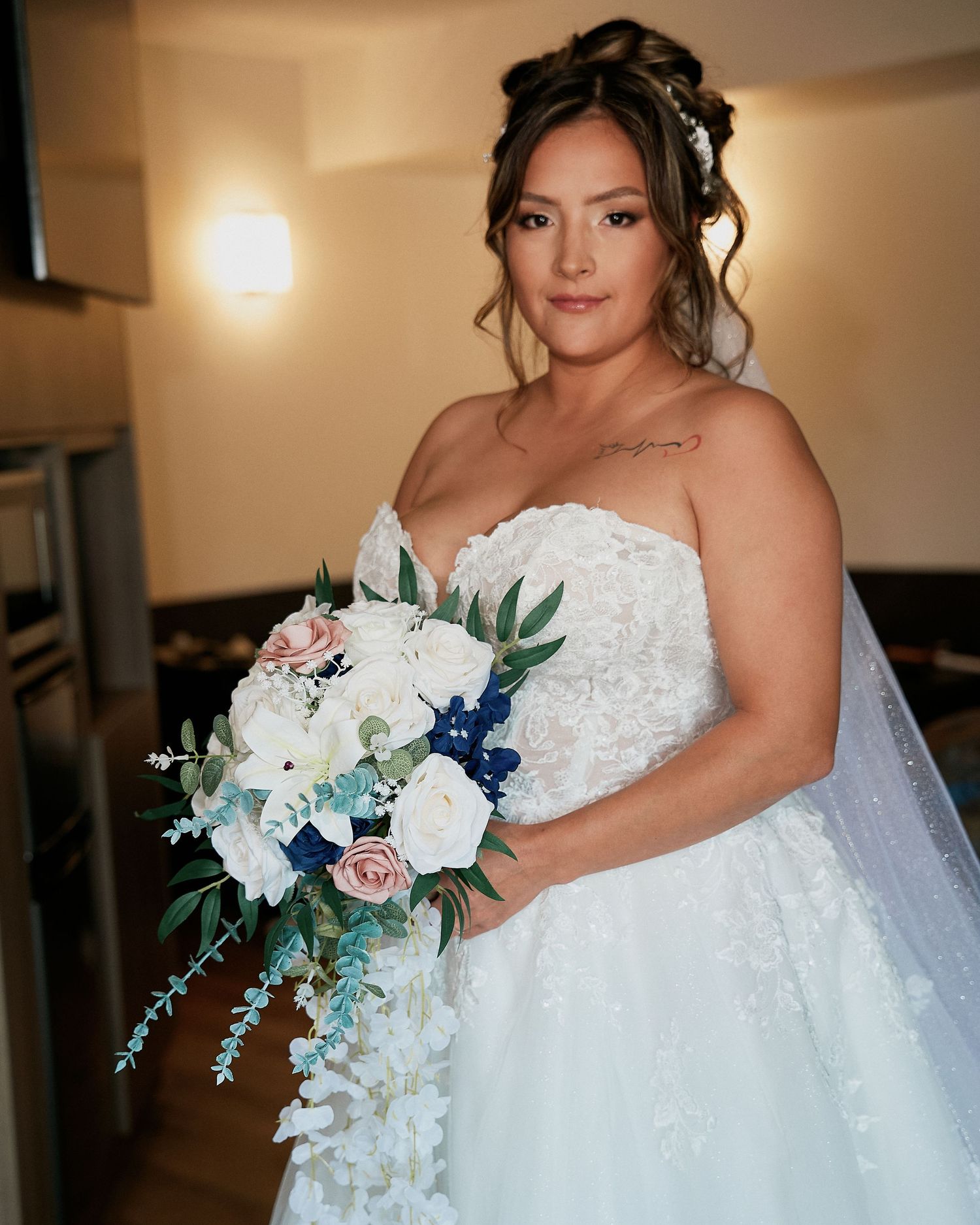 Bride holding her bouquet before the ceremony in Winnipeg