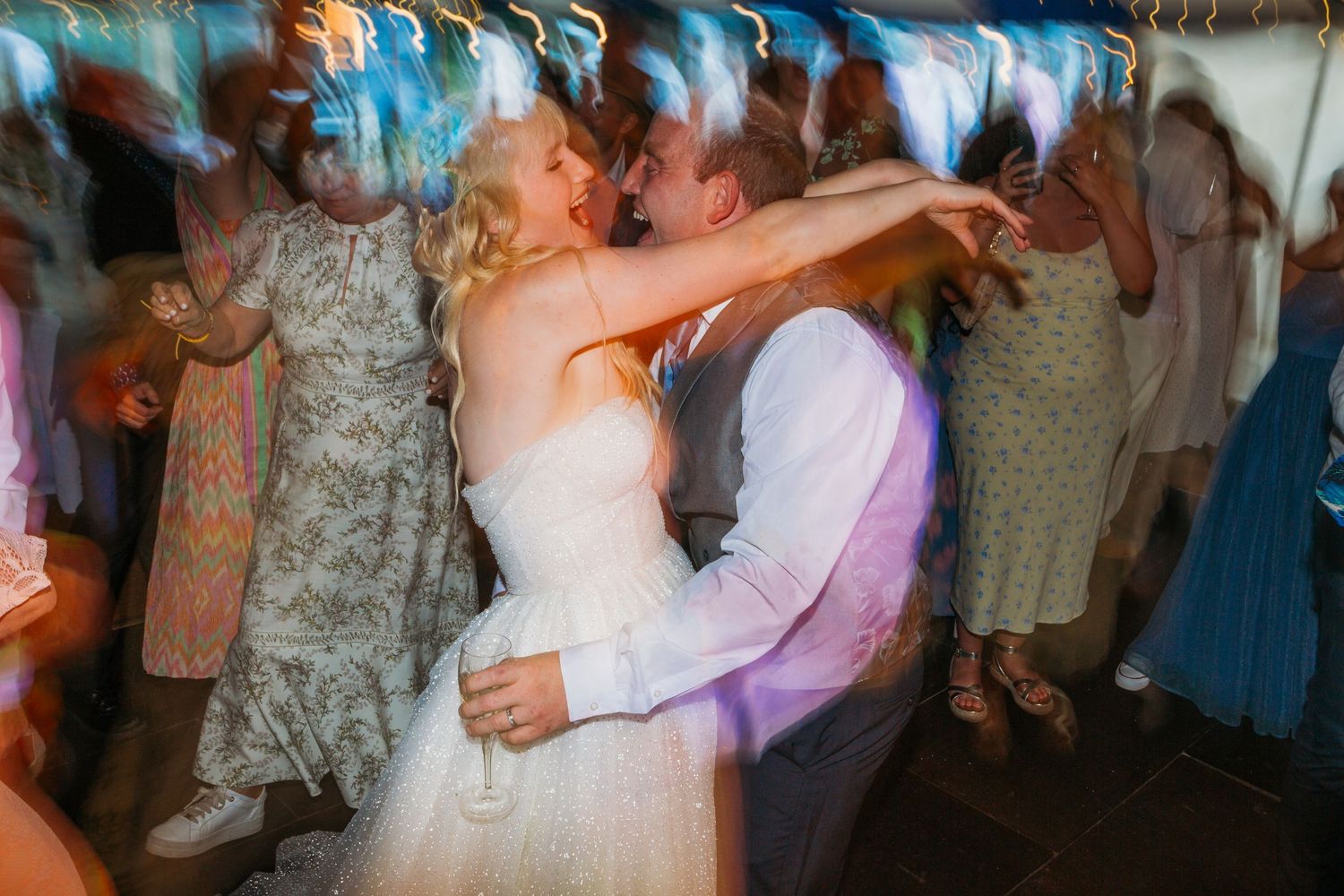bride and groom dancing at wedding reception