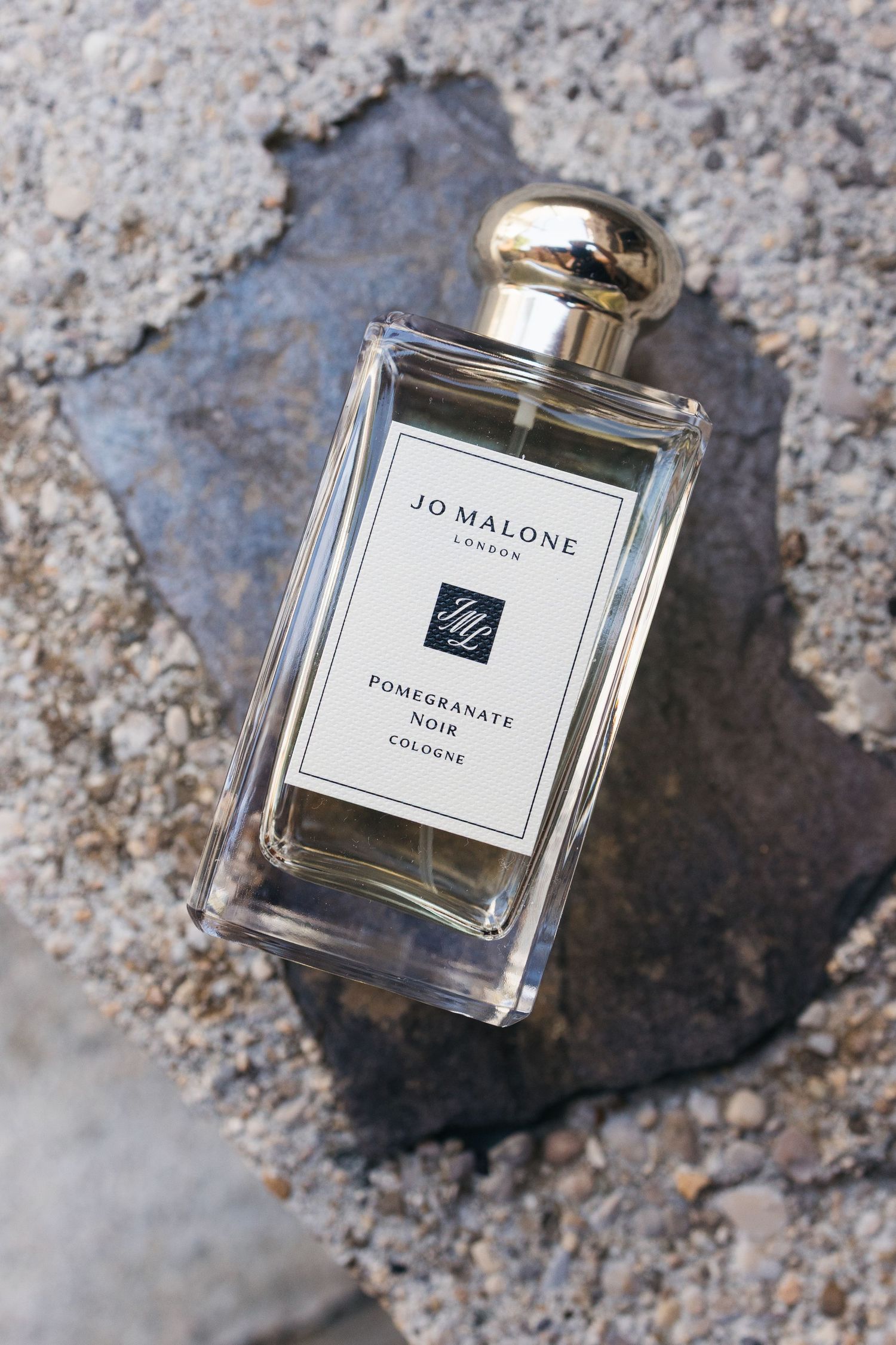 Joe Malone fragrance laid on stone floor