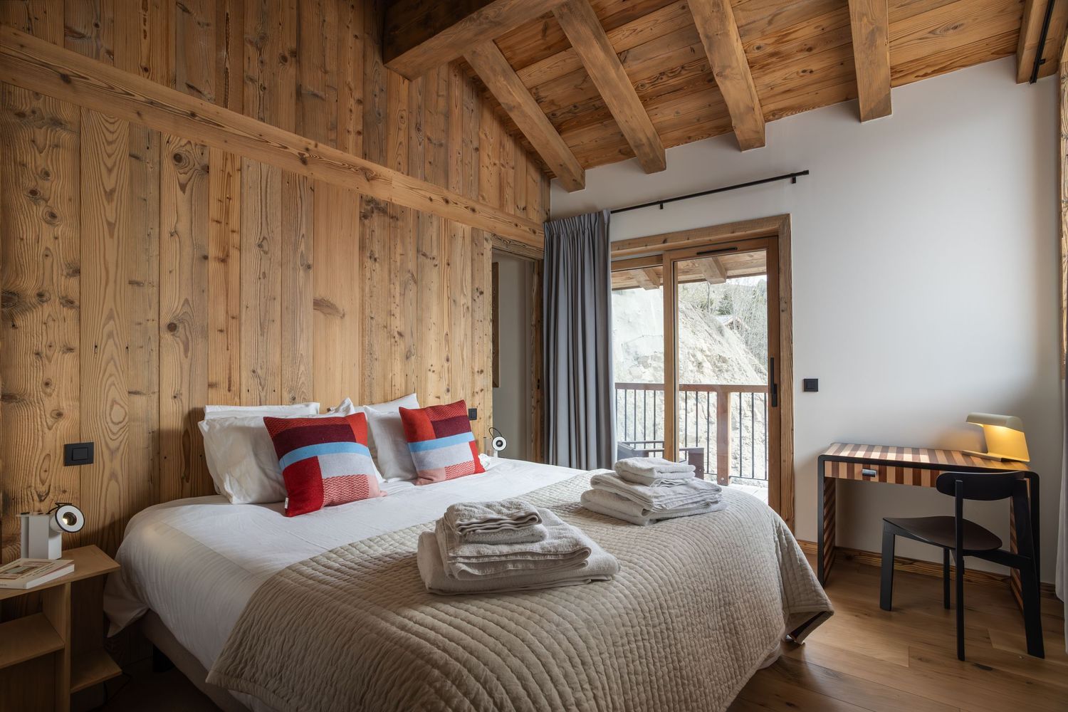 double bed dressed in ski chalet bedroom
