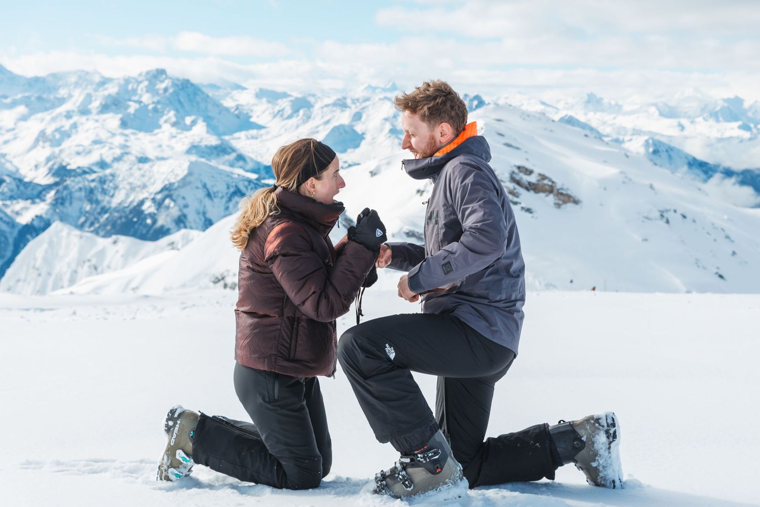 Man proposes to woman on top of ski resort mountain