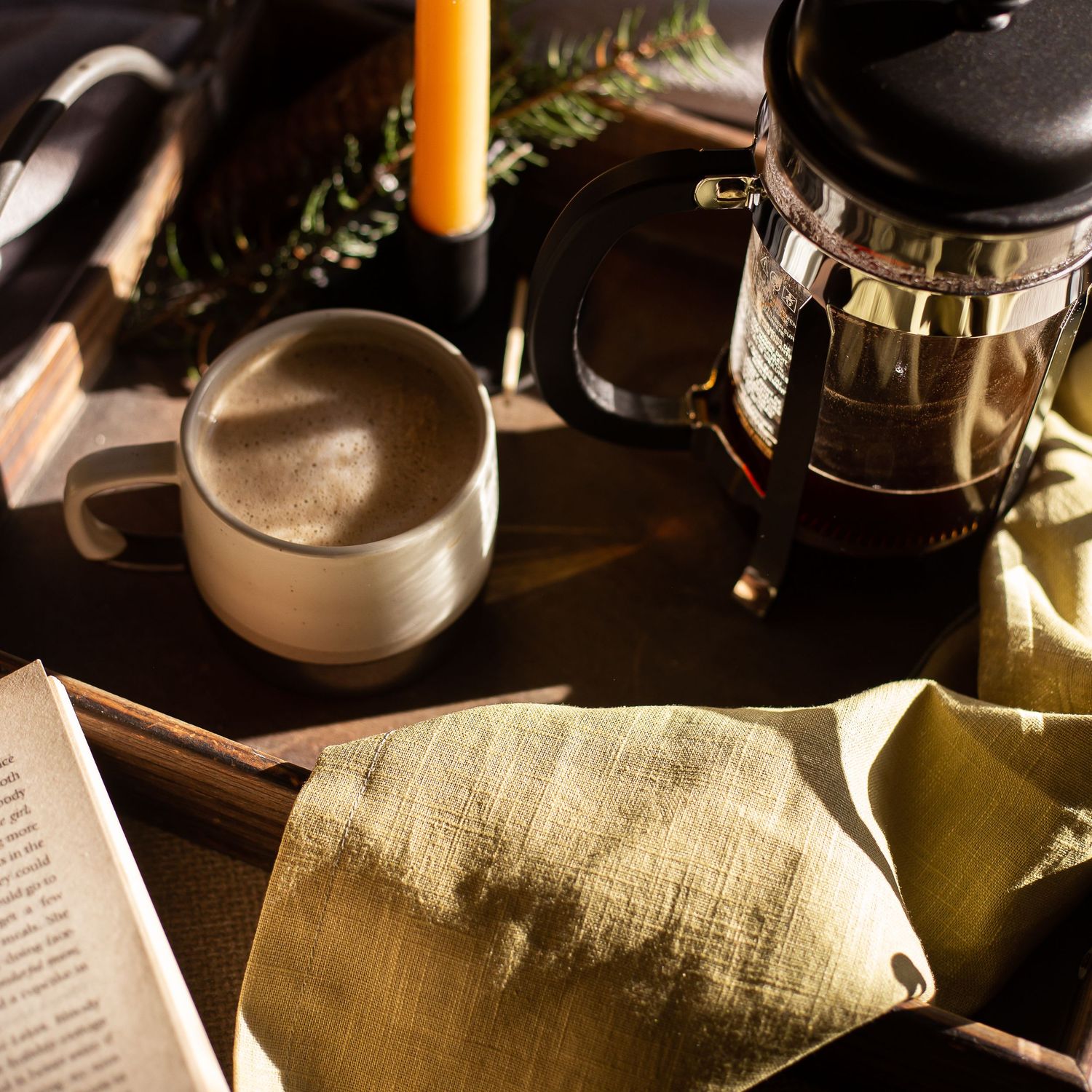mug of coffee and napkin in morning light