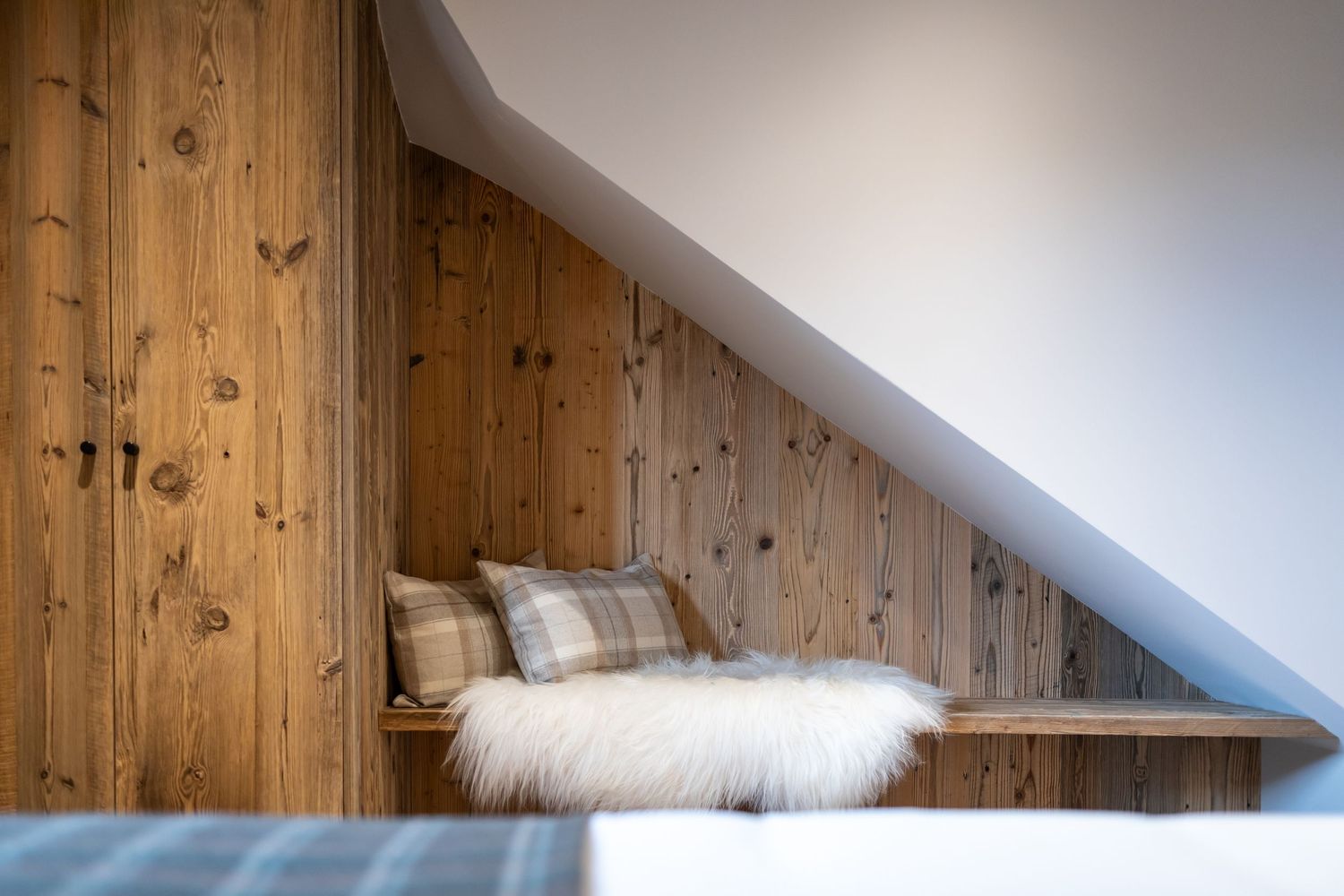 cosy nook in corner of luxury bedroom