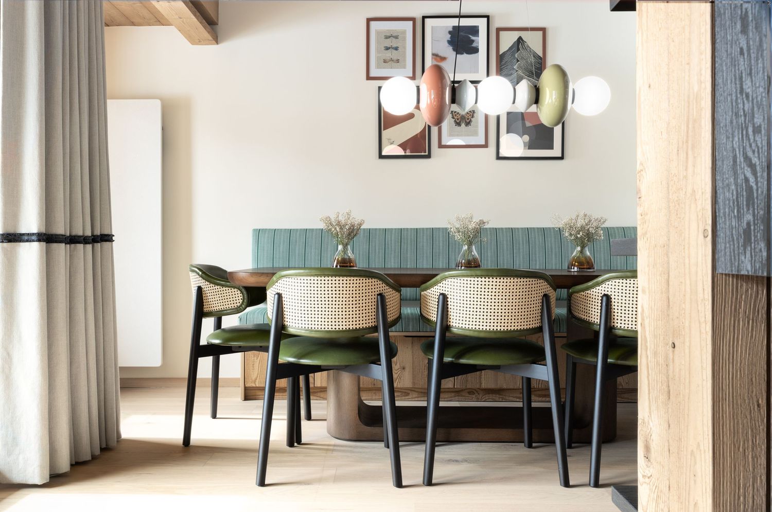side view of modern dining table and chairs shortly after renovation