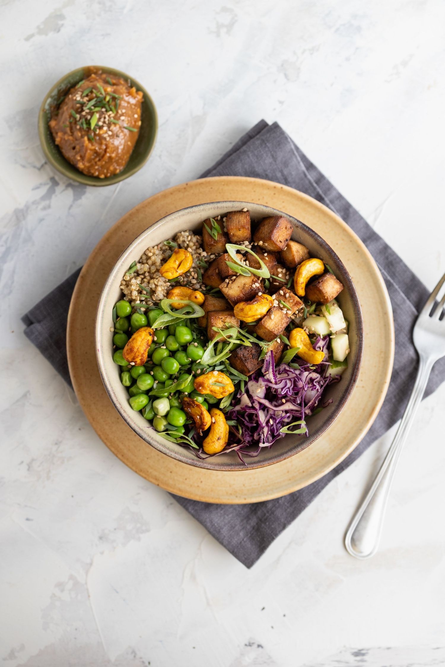 vibrant bowl of asian salad with peanut sauce