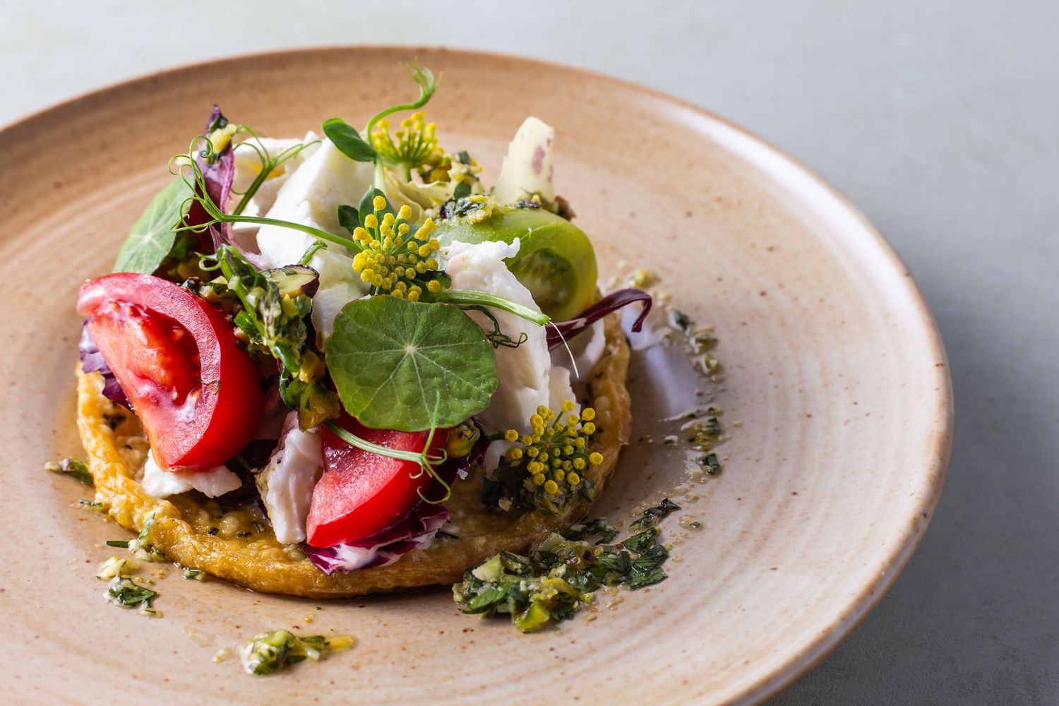 garden salad nicely dressed on plate