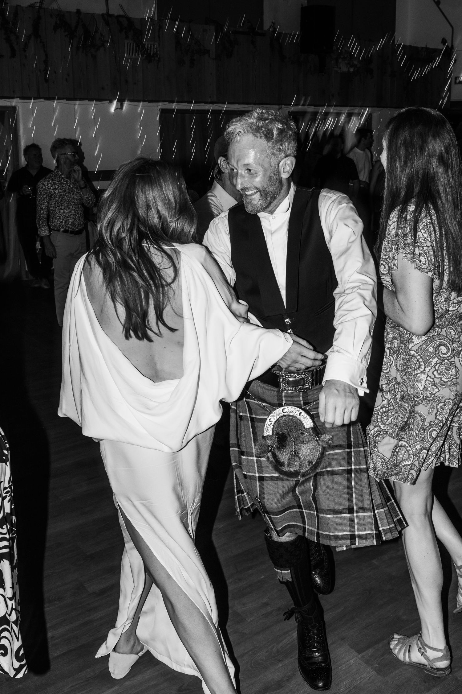 bride and Scottish husband dance during wedding reception