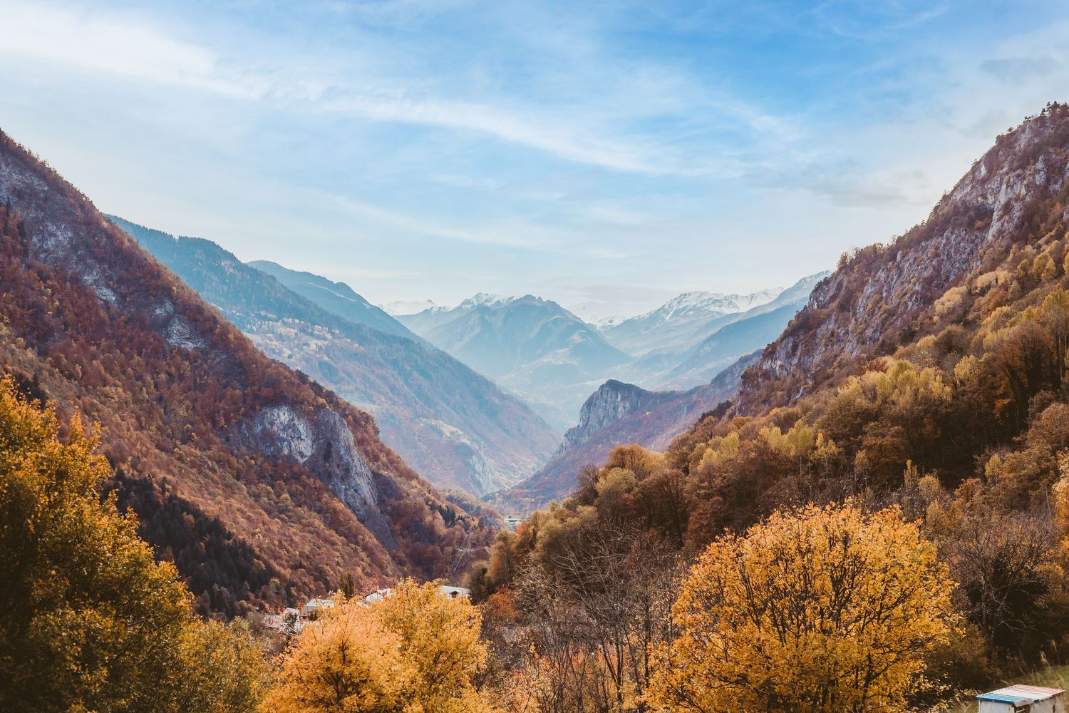 bright autumnal colours cover a valley