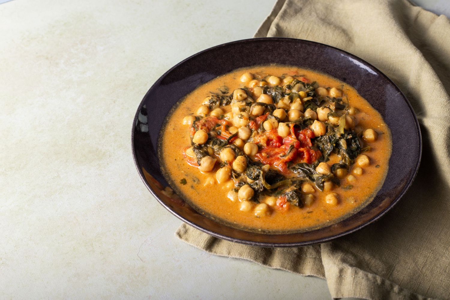 down of chickpea curry on a green background