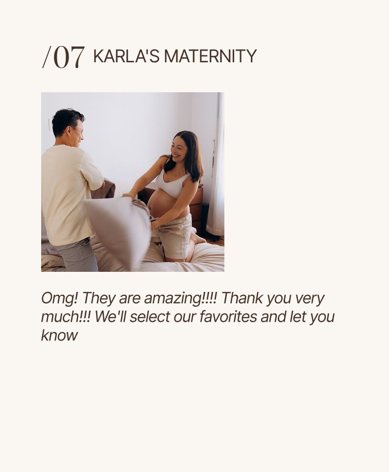 Couple sharing a tender moment during a maternity photo session, with the pregnant woman sitting on a bed.