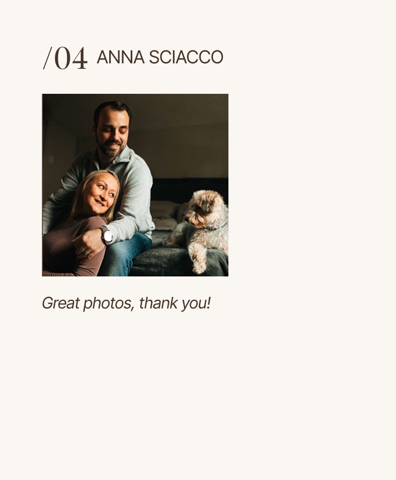 Couple smiling with fluffy dog on couch, casual indoor portrait photography session.