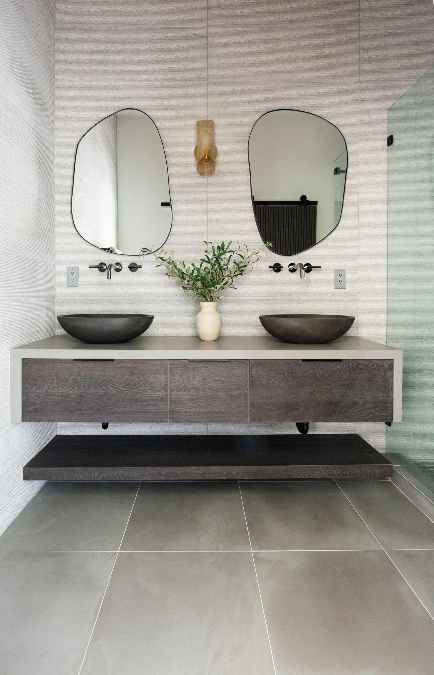 Architectural photographer image for an interior designer in Southern California of an organic modern customdesigned double floating vanity.
