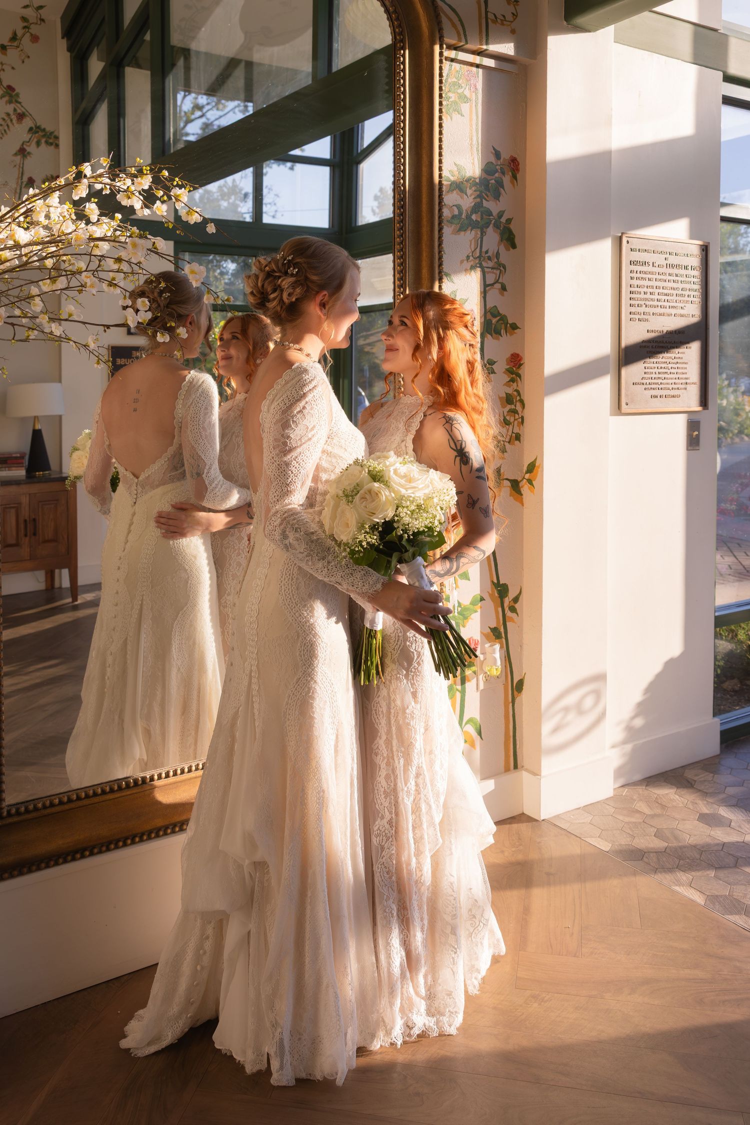 A sequence of wedding photos showing bridesmaids in flowing white dresses gathered in a sunlit venue hallway.