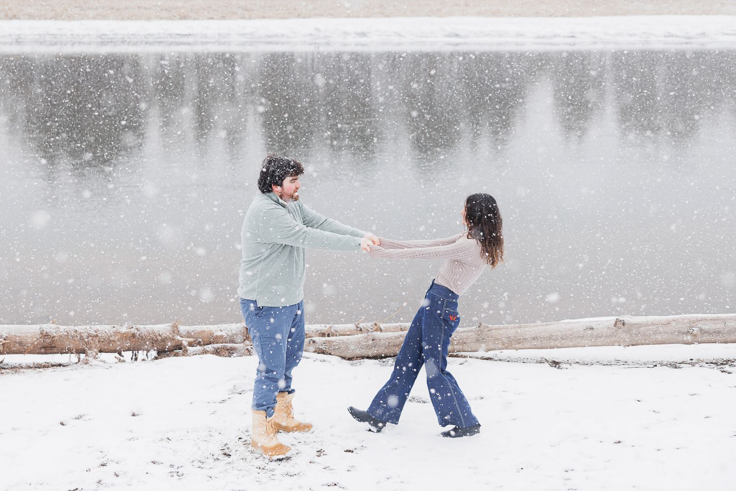 A sequence of five photos showing people falling down in the snow while playing outdoors in winter.