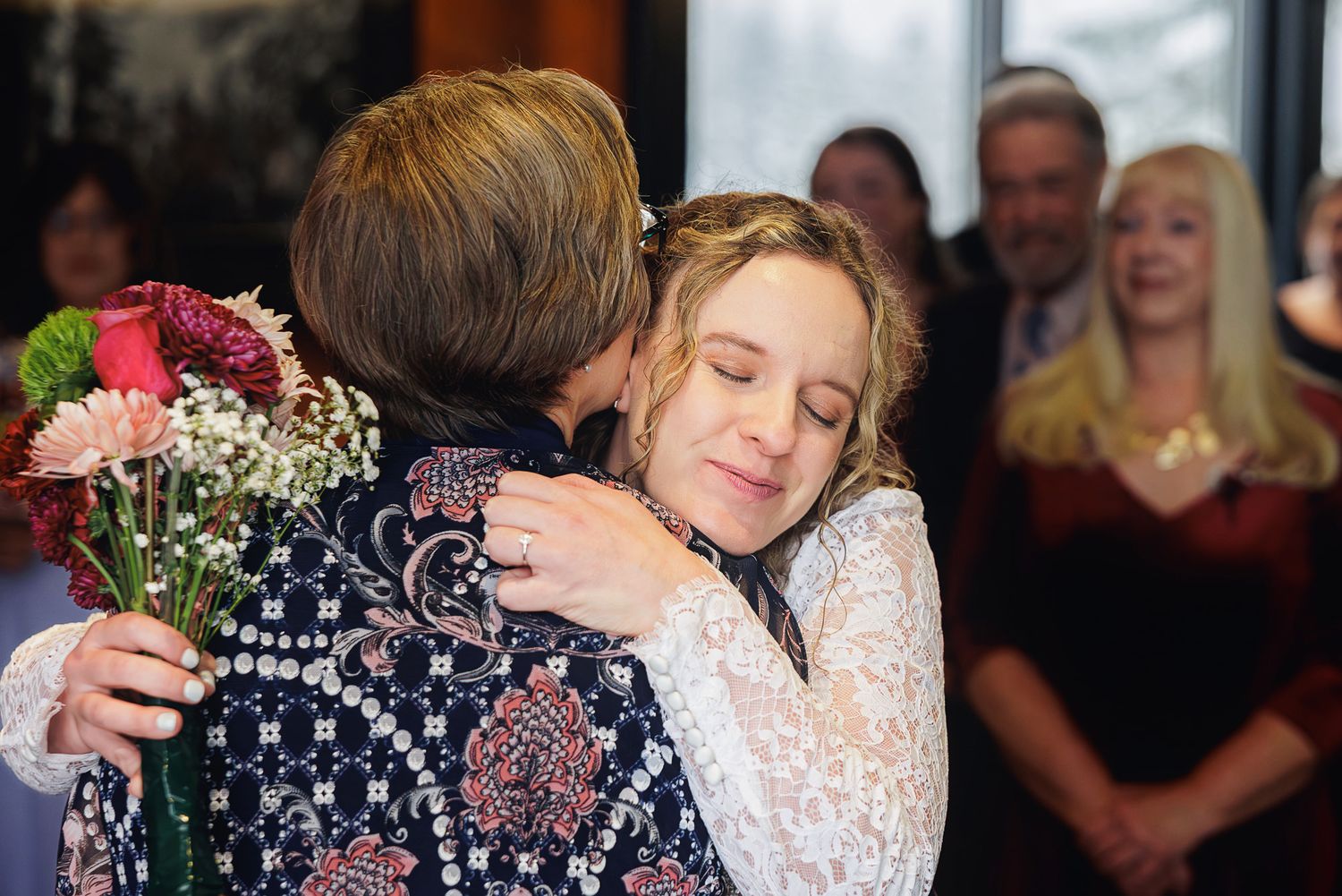 A series of wedding photos showing tender moments between couples during their first dance at a reception.