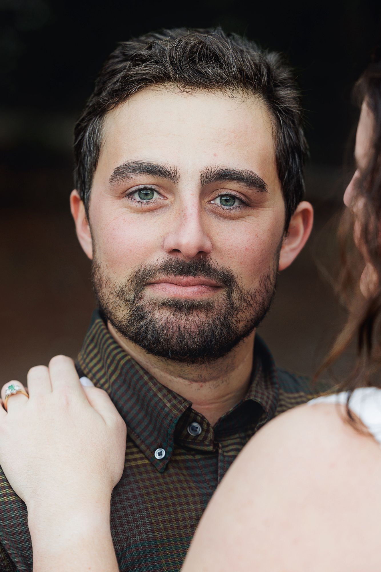 A sequence of close-up portrait shots showing a bearded man with blue eyes making different facial expressions.