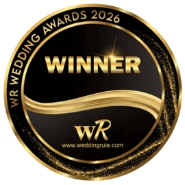 Gold and black WR Wedding Awards 2026 Winner medallion badge from weddingrule.com.