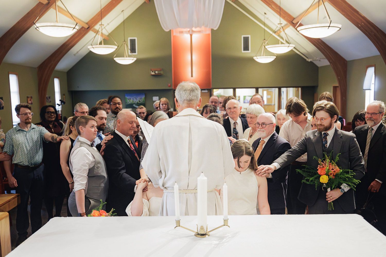 A series of wedding ceremony photos showing guests and a couple exchanging vows at the altar in a church setting.