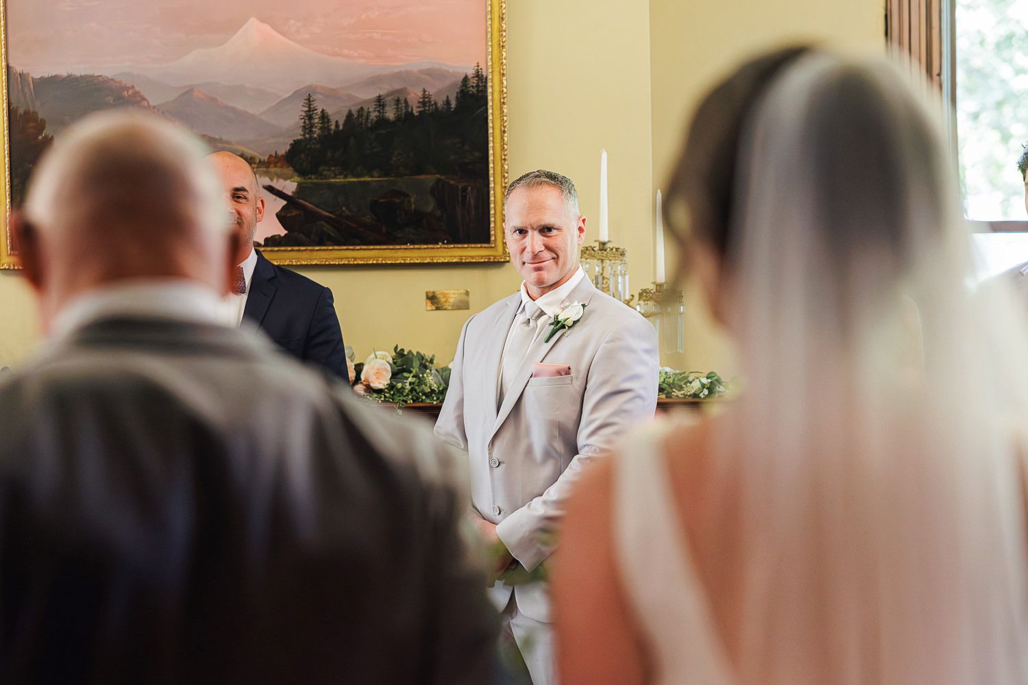 A series of photos showing a celebration inside a venue with guests socializing and dancing at a special event.