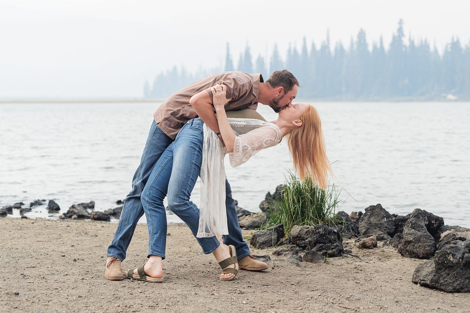 A collection of romantic beach engagement photos showing couples embracing near the ocean shore.