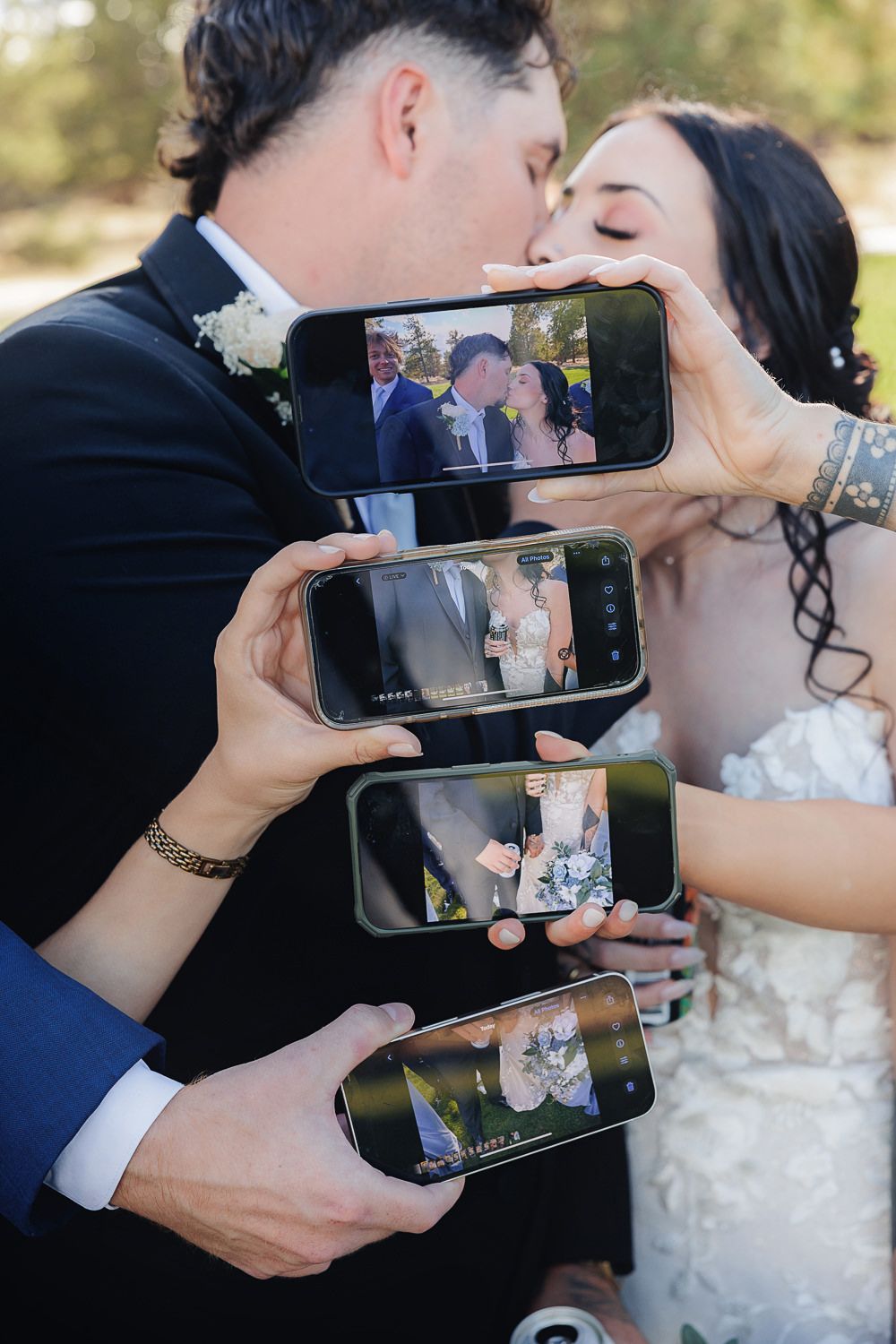 A series of five photos showing a couple taking a selfie while kissing, captured in their wedding attire.