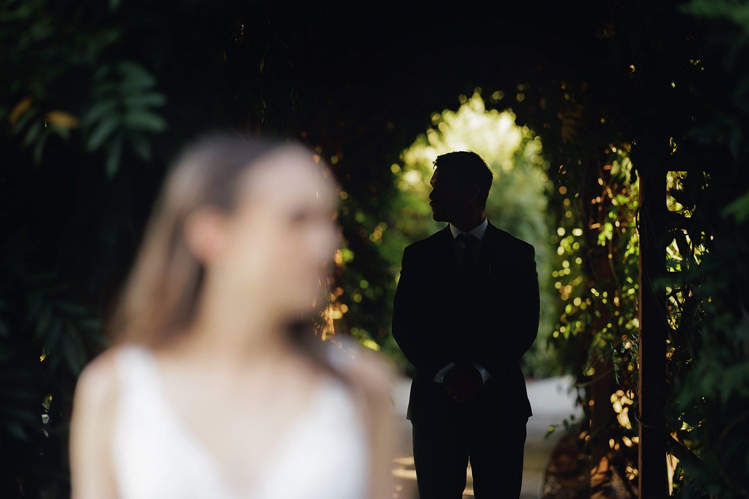 A collection of wedding photographs displayed in a horizontal filmstrip layout showing outdoor ceremony moments.