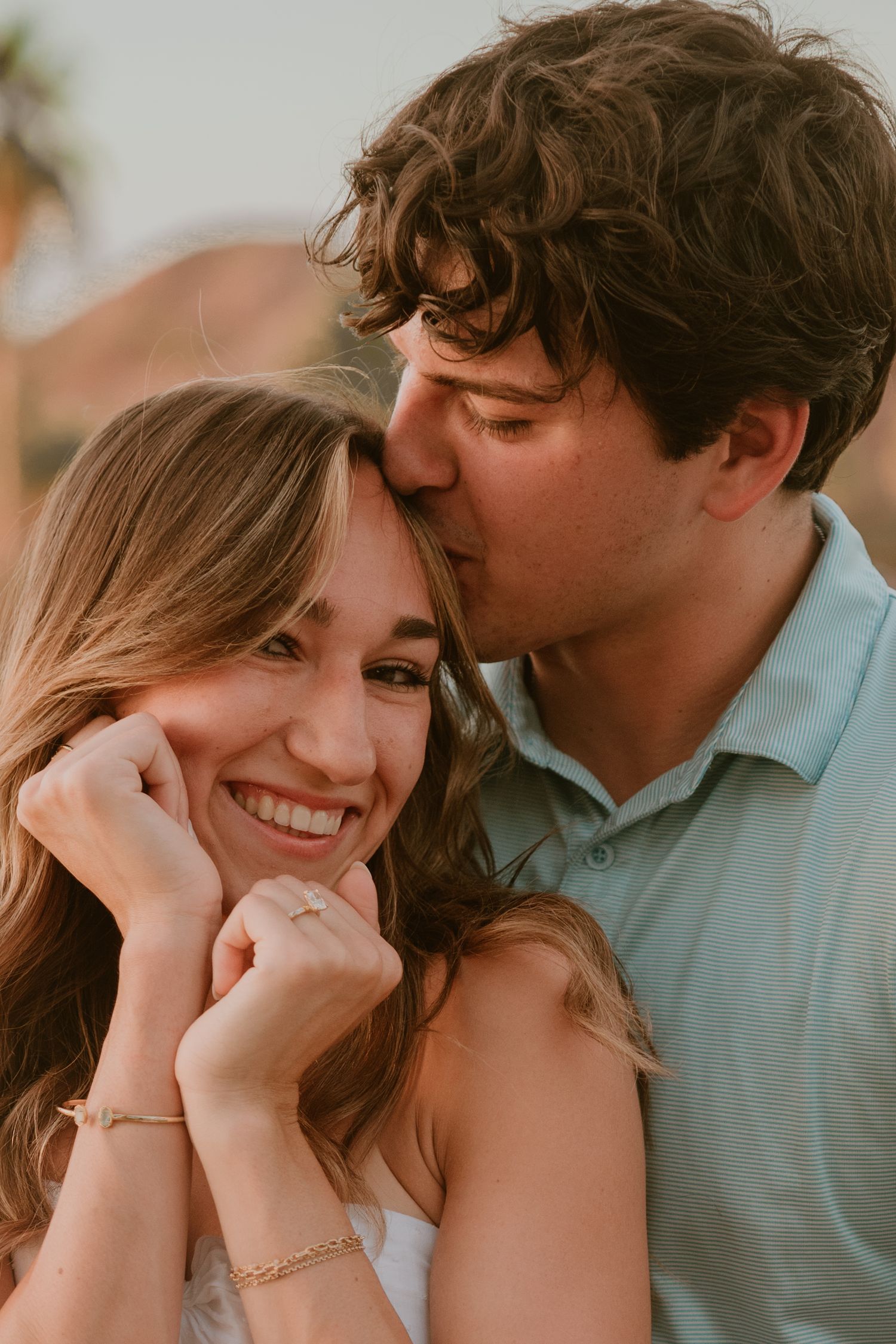 Romantic couple sharing intimate moments in a series of close-up photos.