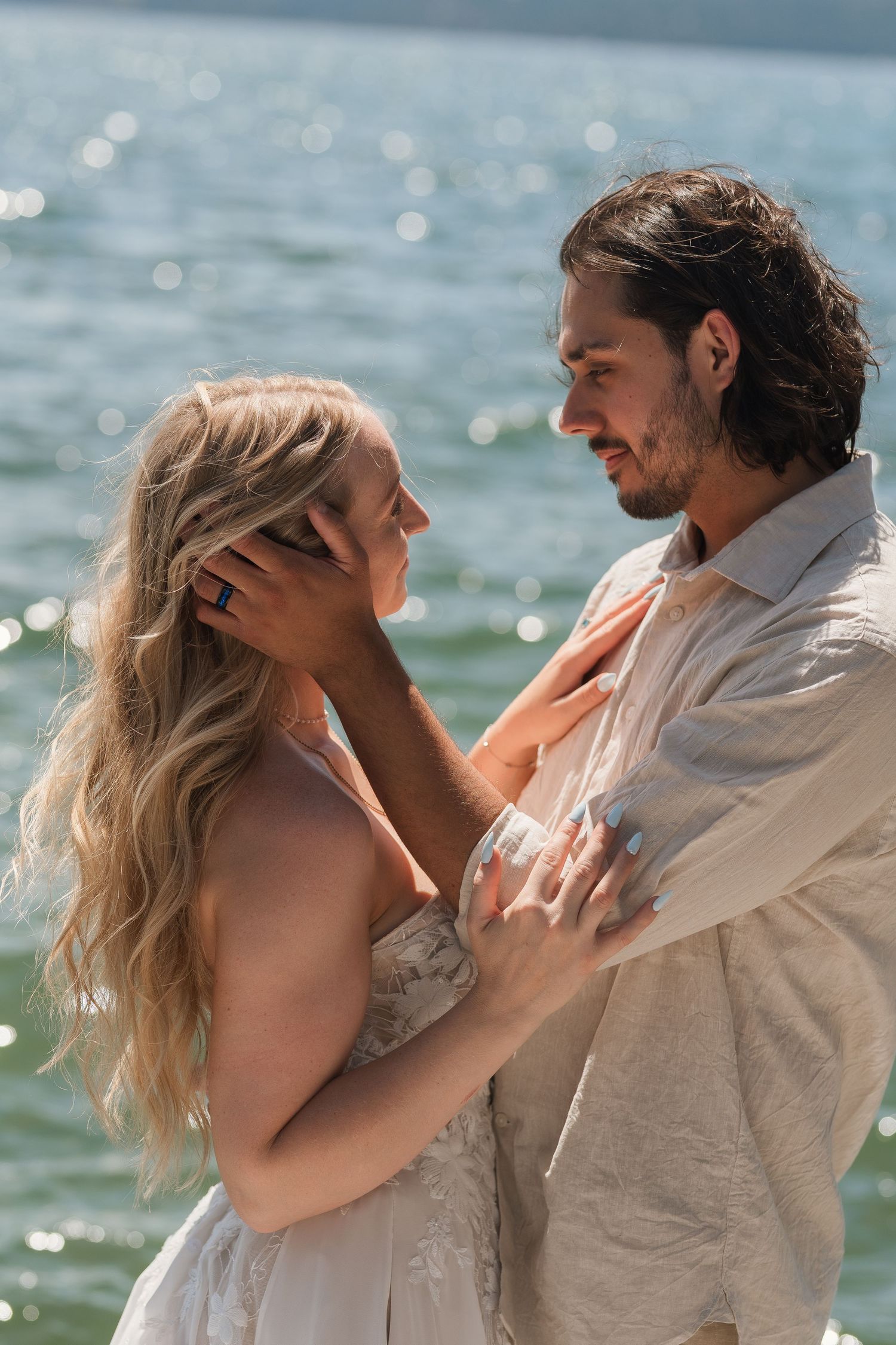 Wedding couple portraits by the lake in Sandpoint, Idaho. Wedding photography for Spokane, Washington and Pacific northwest couples.