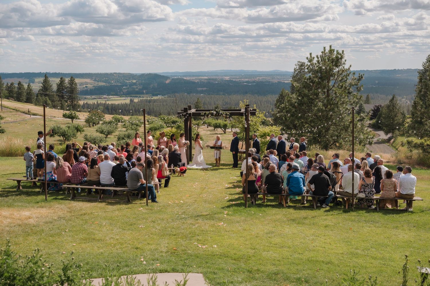 Wedding ceremony on a hilltop. Wedding Photography Spokane, Washington Photographer.