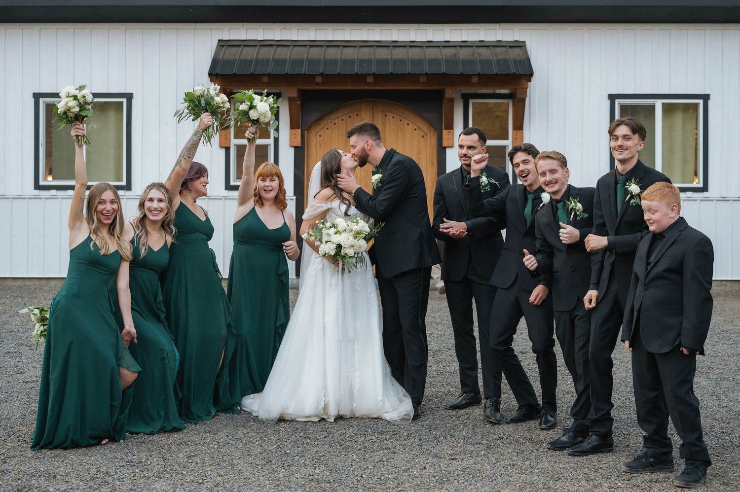 Wedding party portraits dark green dresses and black suits. Wedding photography for Spokane, Washington and pacific northwest couples.