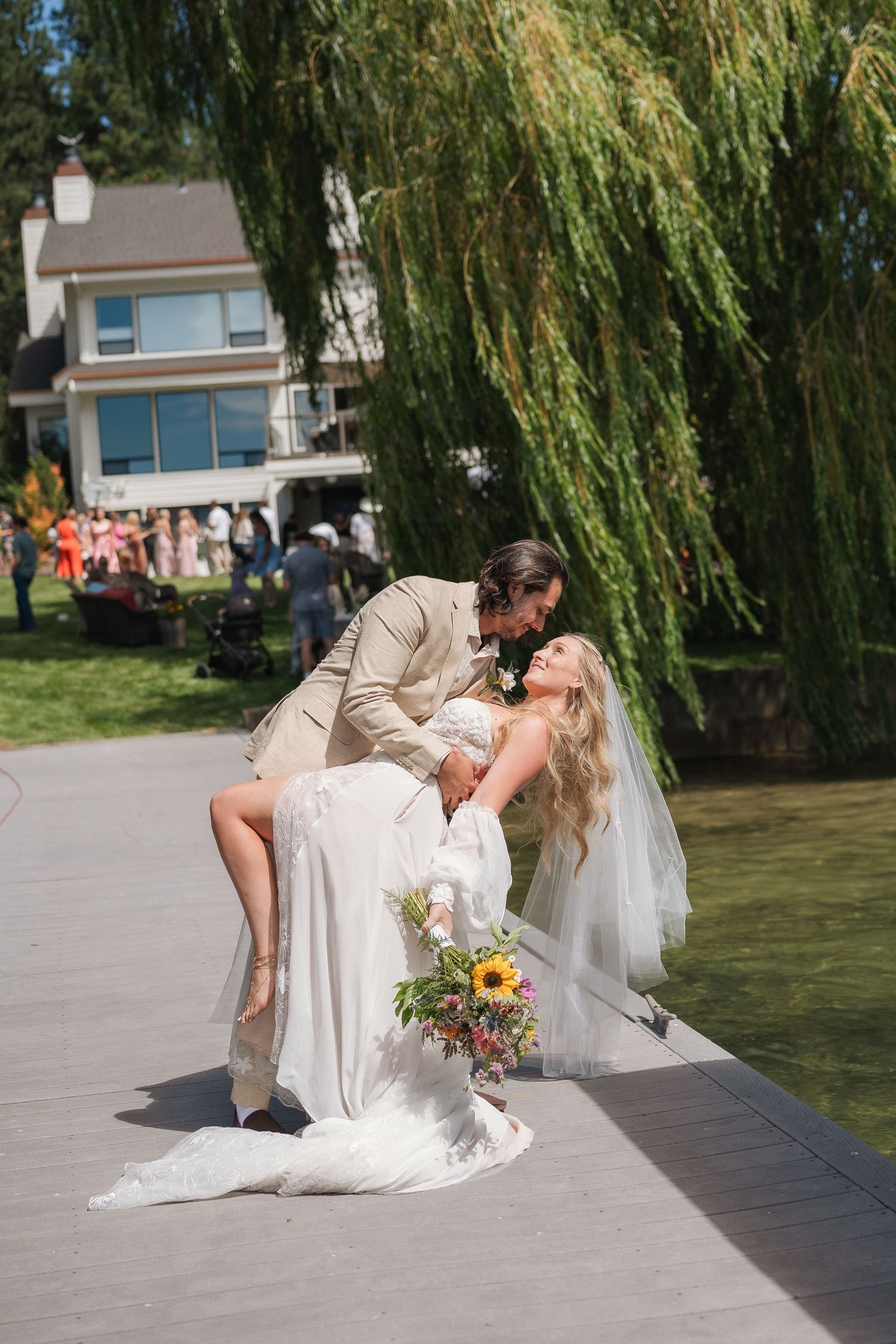 Wedding couple portraits by the lake in Sandpoint, Idaho. Wedding photography for Spokane, Washington and Pacific northwest couples.