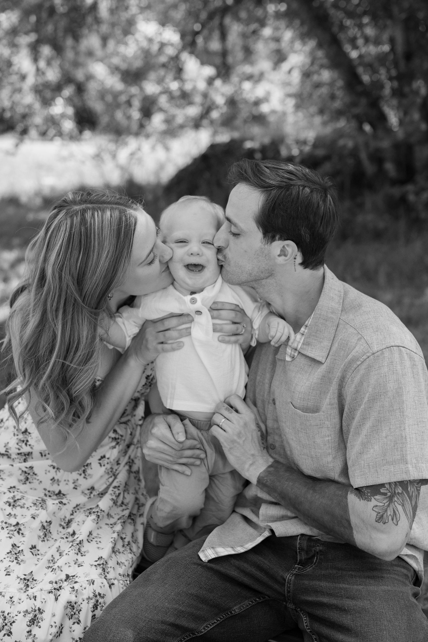 Black and white candid photo series showing tender family moments on a park bench with joyful expressions.