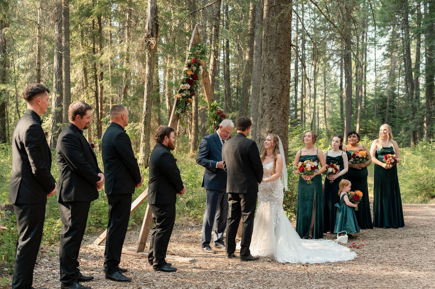 Wedding ceremony in a forest. Wedding Photography Spokane, Washington Photographer.
