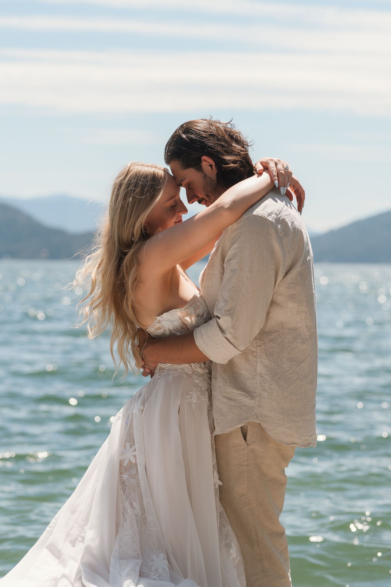 Wedding couple portraits by the lake in Sandpoint, Idaho. Wedding photography for Spokane, Washington and Pacific northwest couples.